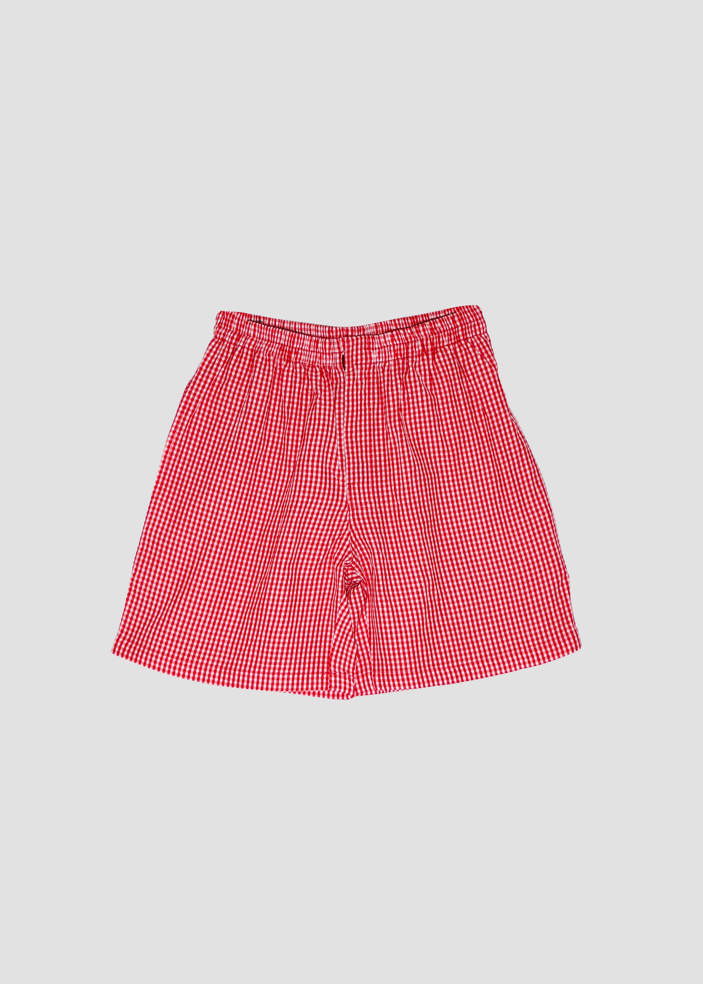 Pantaloncini estivi da donna in cotone a quadretti rosso, IGI AMA, 100% cotone leggero, chiusura con bottone e zip, vita elasticizzata, taglia unica, made in India, perfetti per outfit casual e look vacanza.