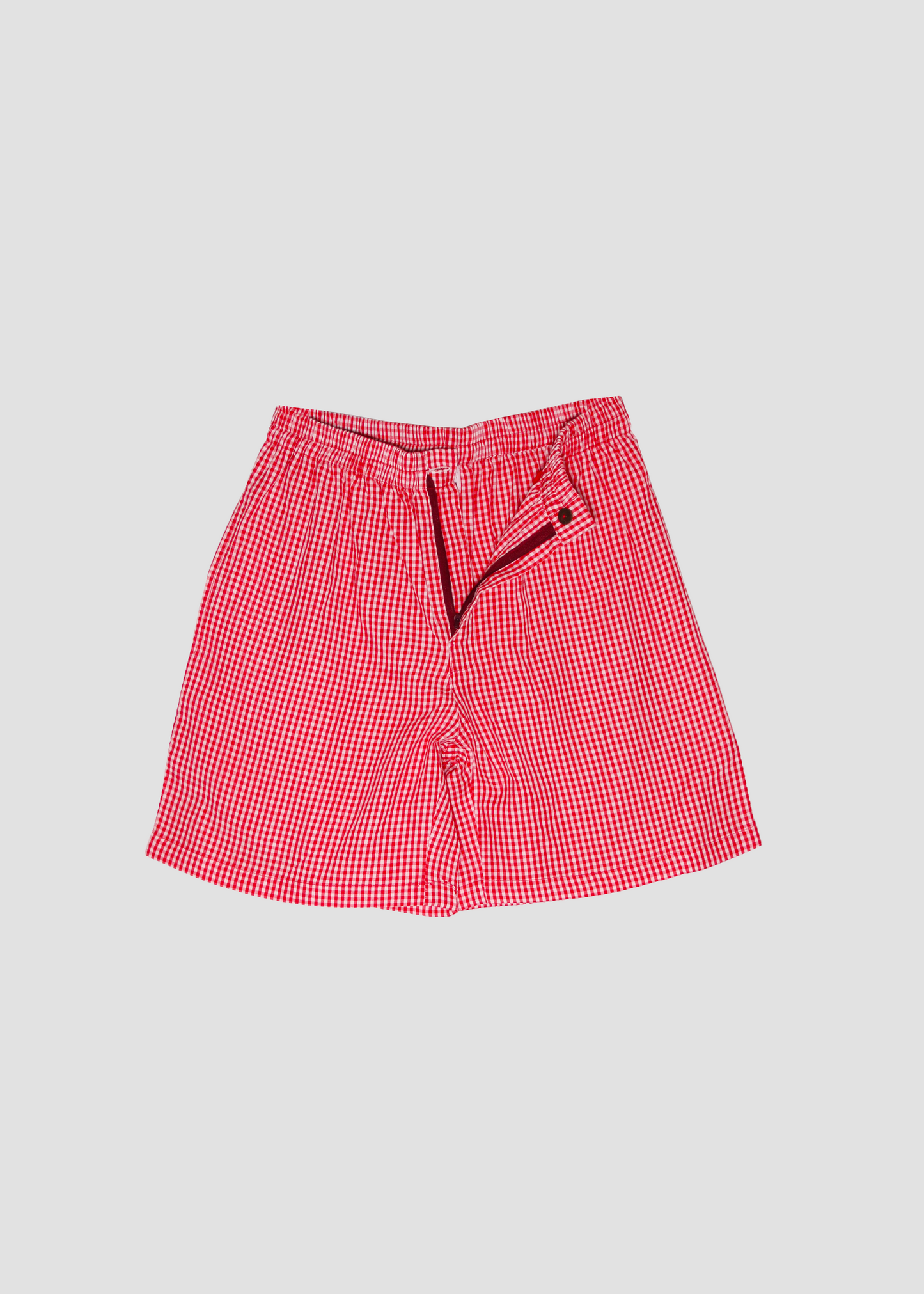 Pantaloncini estivi da donna in cotone a quadretti rosso, IGI AMA, 100% cotone leggero, chiusura con bottone e zip, vita elasticizzata, taglia unica, made in India, perfetti per outfit casual e look vacanza.