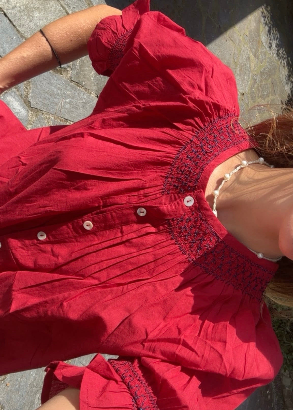 Bougainville red shirt worn by model IGI AMA