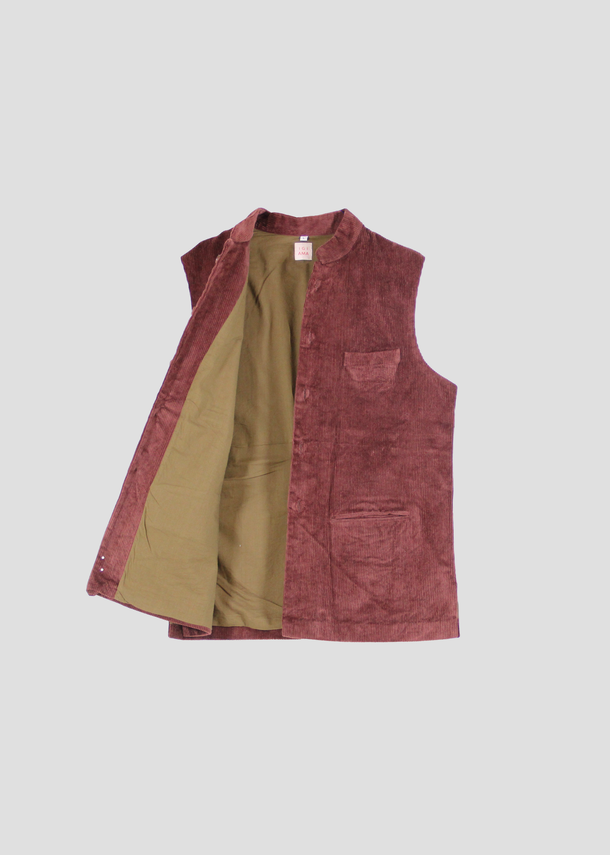 Gilet Hunting in Burnt Brown Corduroy, men's vest in burnt brown corduroy with green lining. Made in corduroy with cotton lining. Mandarin collar. Made in India. Dry clean only, iron at low heat, do not bleach.