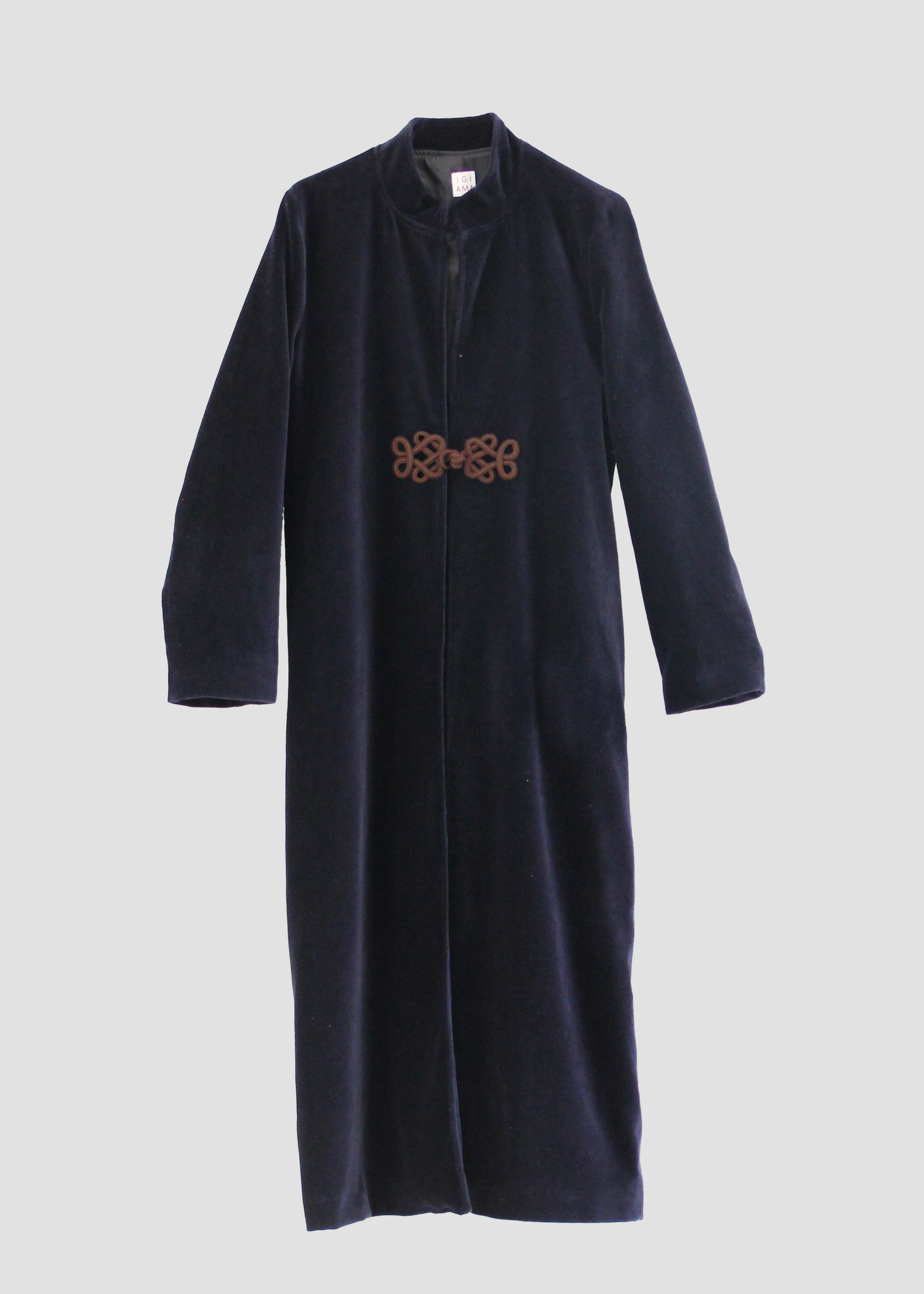 Alamari Coat in Navy Blue with Dark Alamari, velvet navy blue coat with dark alamari, mandarin collar, and frog buttons. Structured shoulders and polyester lining. Made in India with an elegant and refined design. Dry clean only, iron on low heat, do not bleach.