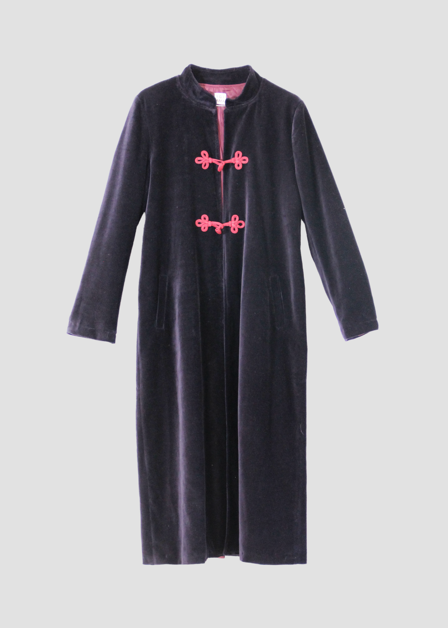 Alamari Coat in Navy blue/red Alamari, velvet navy blue coat with red alamari, mandarin collar, and frog buttons. Structured shoulders and polyester lining. Made in India with an elegant and refined design. Dry clean only, iron on low heat, do not bleach.