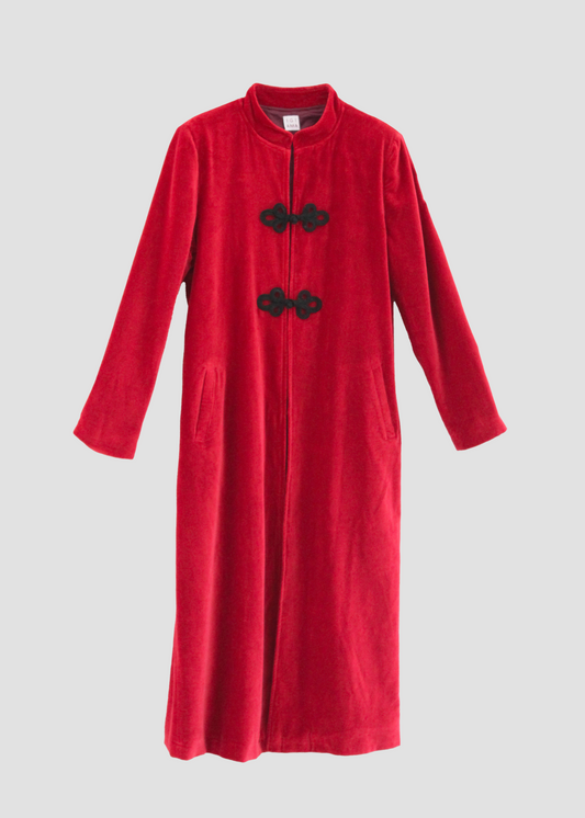 Alamari Coat in Red/Black Alamari, velvet red coat with black alamari, mandarin collar, and frog buttons. Structured shoulders and polyester lining. Made in India with an elegant and refined design. Dry clean only, iron on low heat, do not bleach.